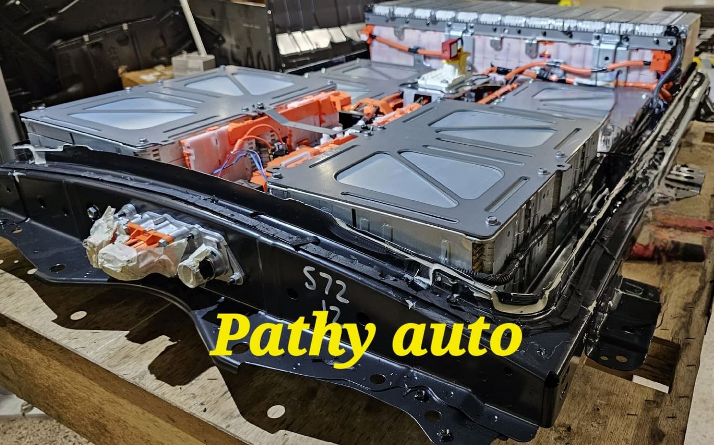Nissan Leaf high-voltage battery pack opened on the bench at Pathy Auto